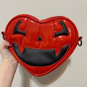 Love Pain and Stitches Heart-Shaped Red and Black Crossbody Bag